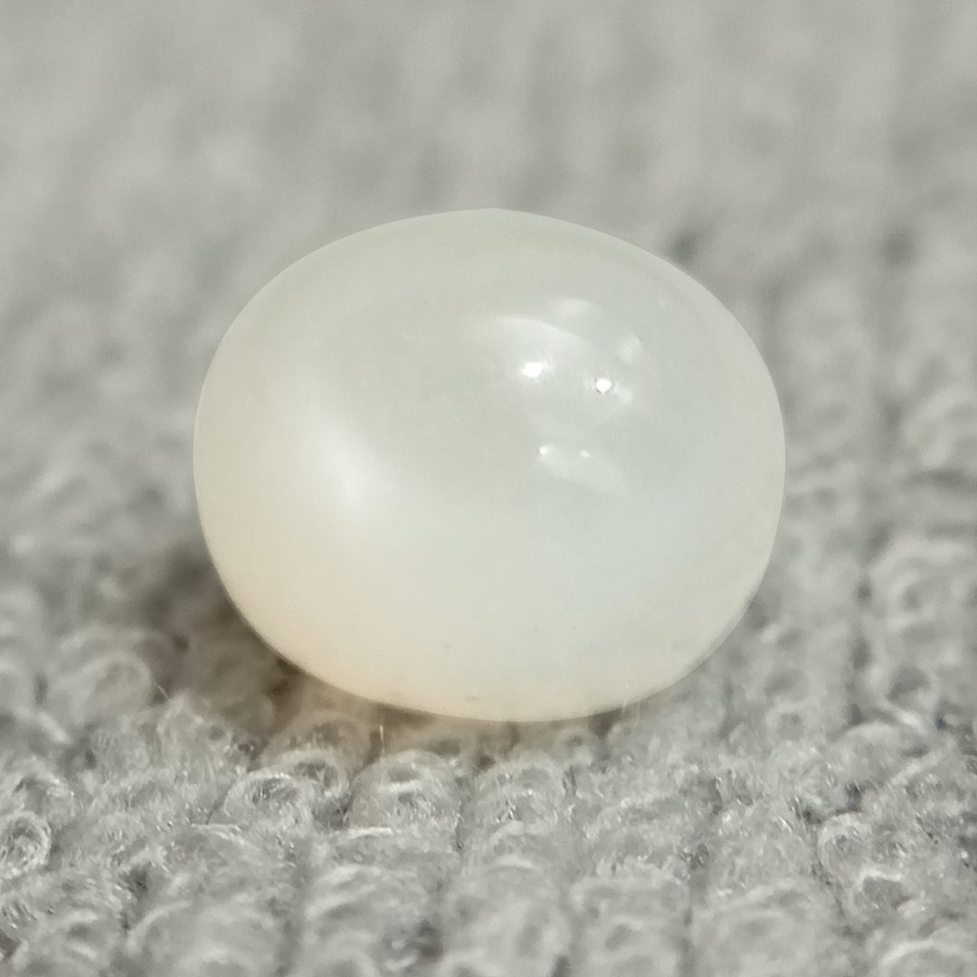 A genuine Natural Moonstone gemstone, revered for emotional healing, intuition, and balance.