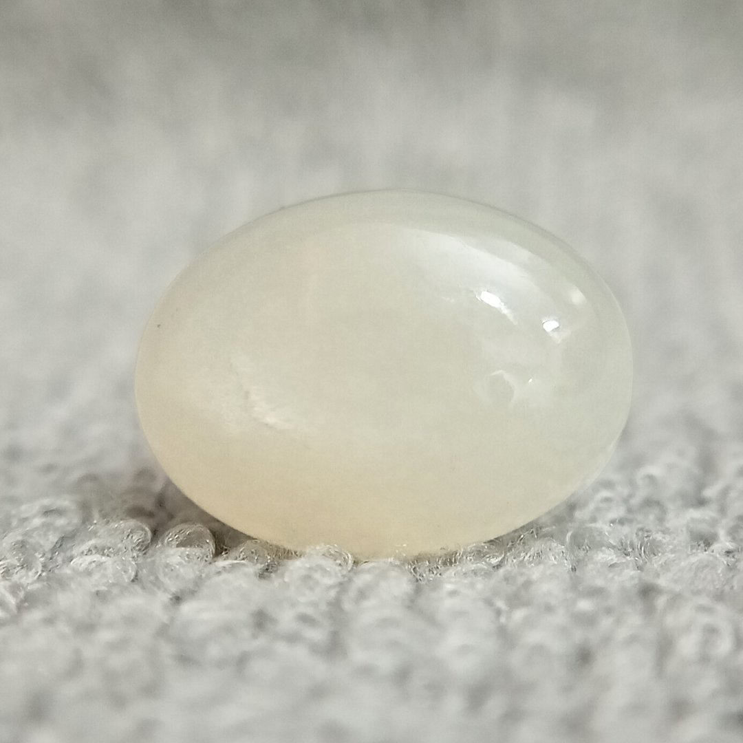A genuine Natural Moonstone gemstone, revered for emotional healing, intuition, and balance.
