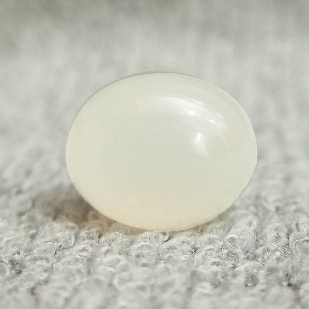 A genuine Natural Moonstone gemstone, revered for emotional healing, intuition, and balance.