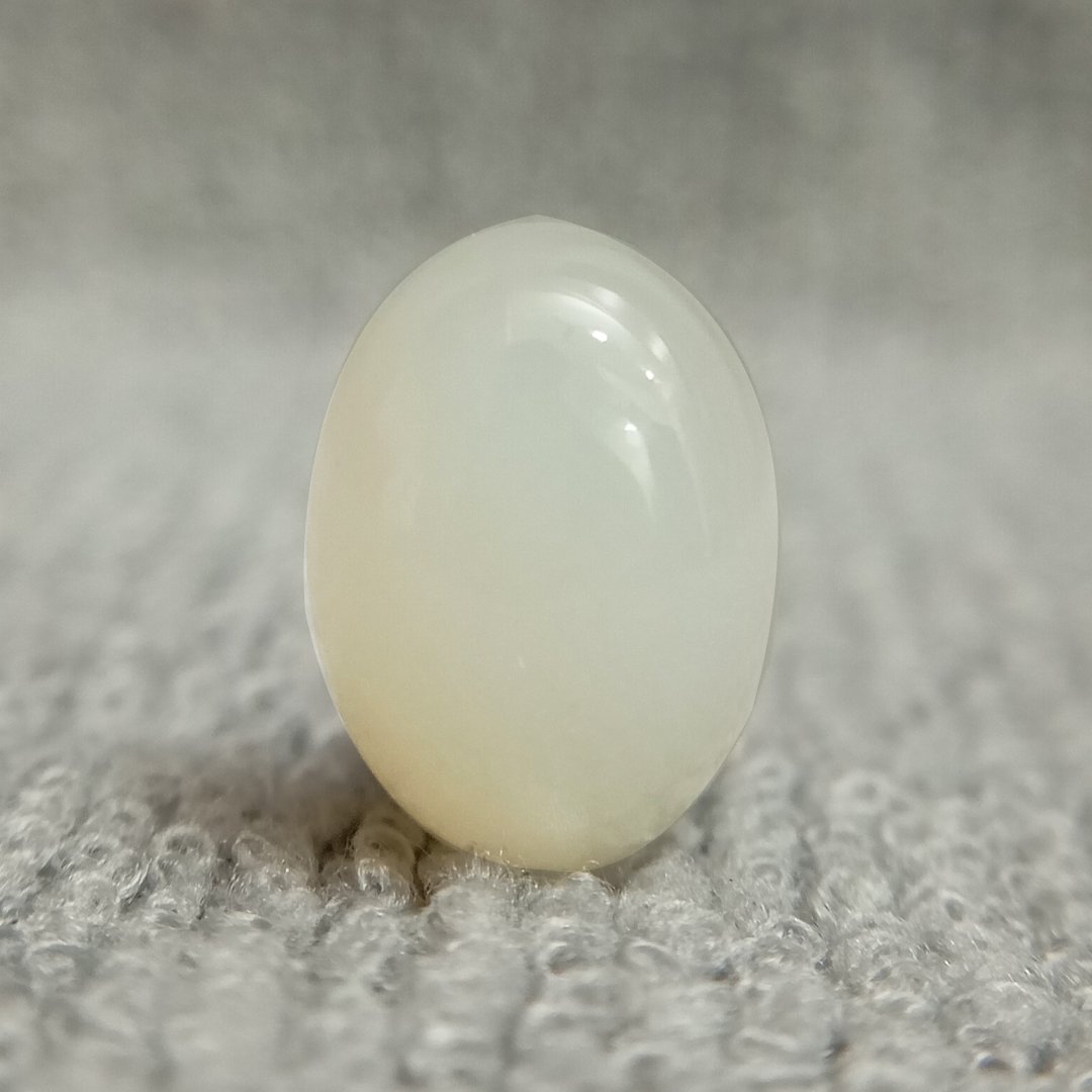 A genuine Natural Moonstone gemstone, revered for emotional healing, intuition, and balance.