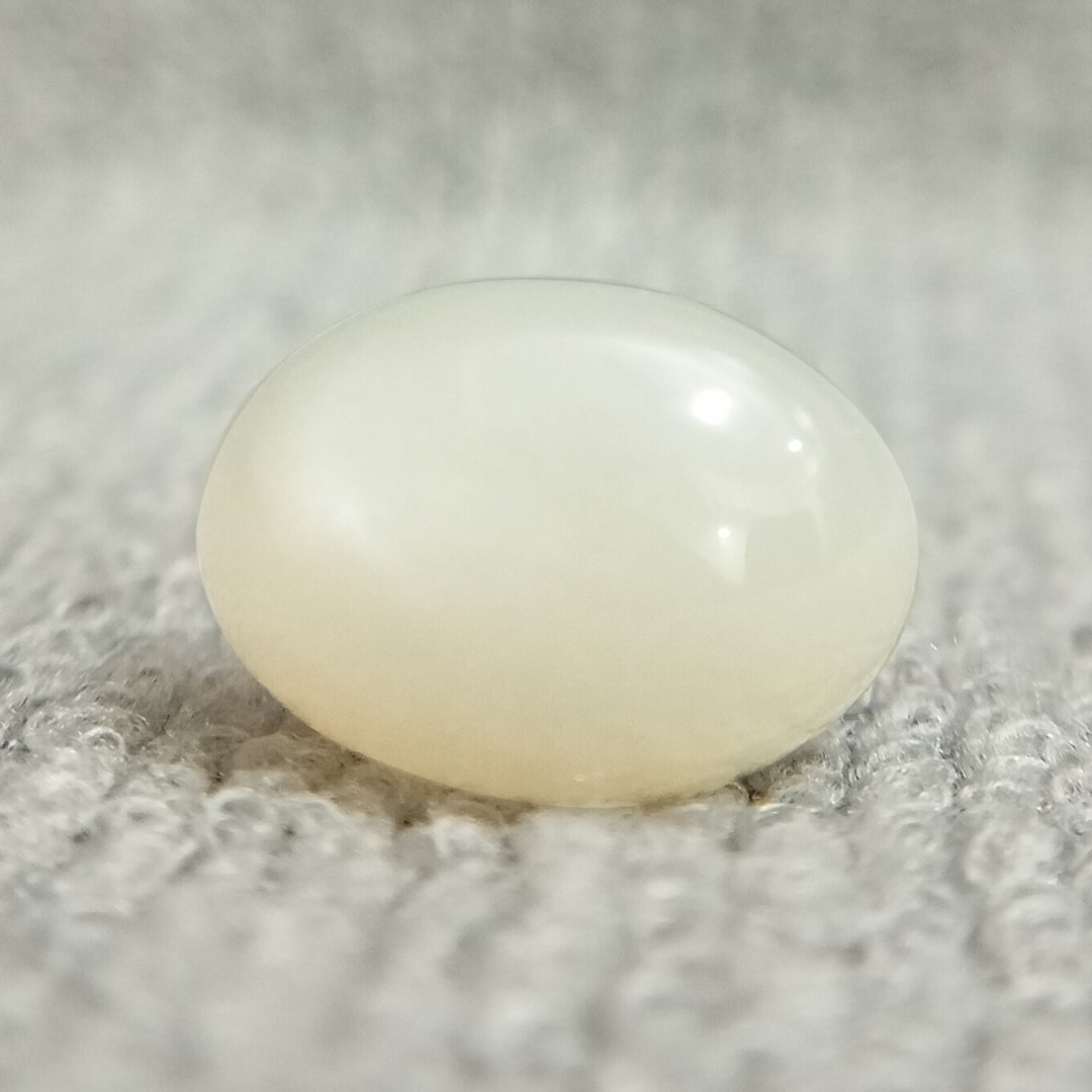 A genuine Natural Moonstone gemstone, revered for emotional healing, intuition, and balance.