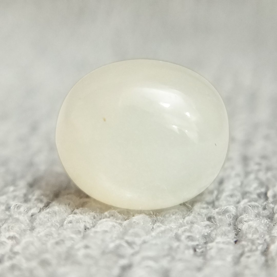 A genuine Natural Moonstone gemstone, revered for emotional healing, intuition, and balance.