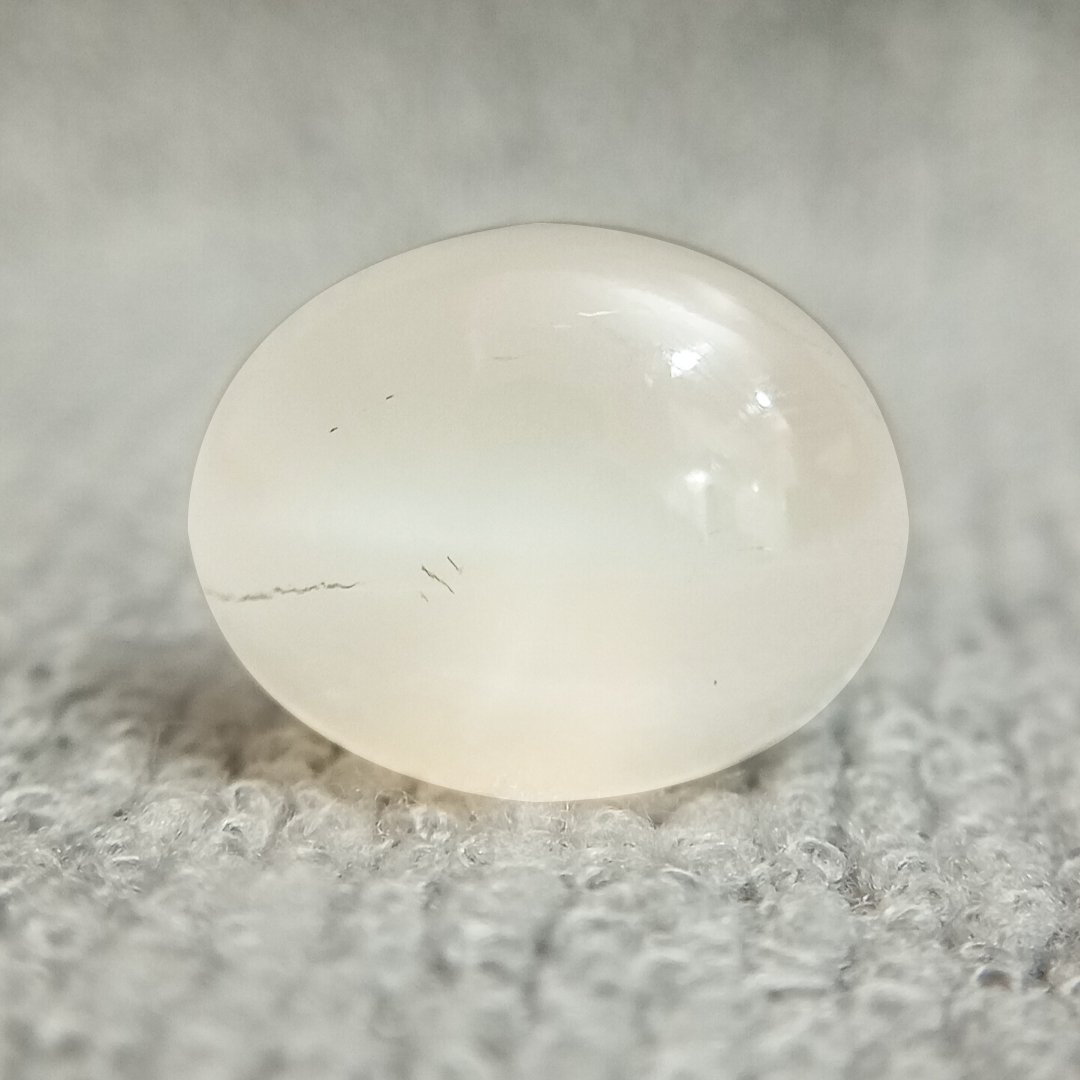 A genuine Natural Moonstone gemstone, revered for emotional healing, intuition, and balance.