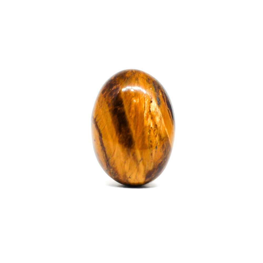 A close-up of a Natural Tiger Eye gemstone showcasing its golden-brown hues and chatoyant effect.