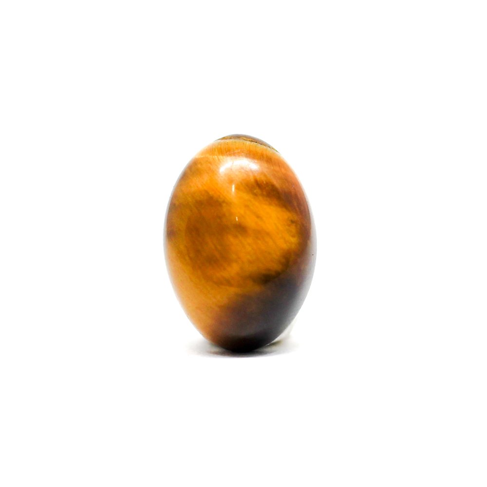 A close-up of a Natural Tiger Eye gemstone showcasing its golden-brown hues and chatoyant effect.