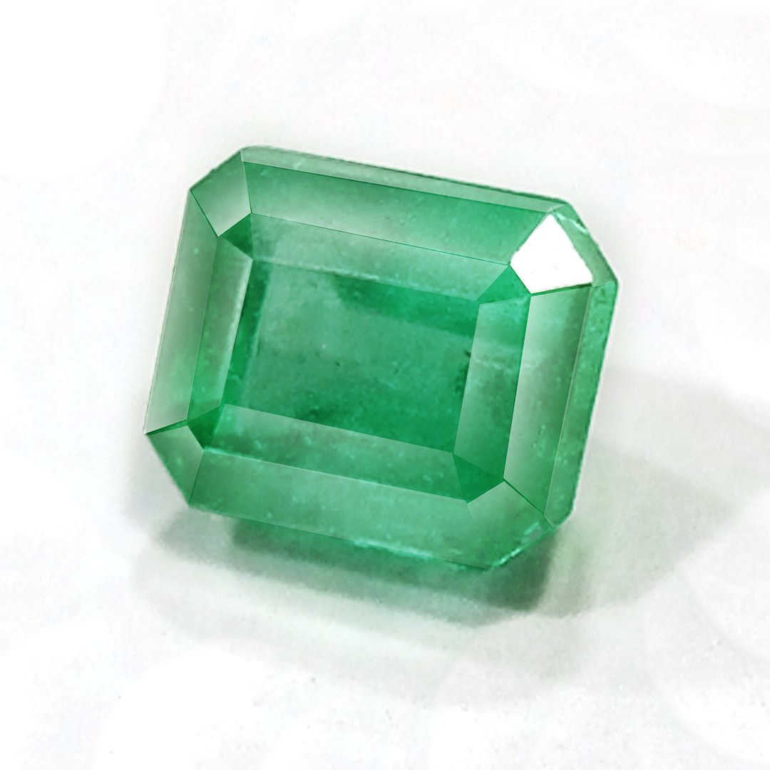 "Close-up of a radiant Zambian Emerald showcasing its vibrant green color and faceted cut."