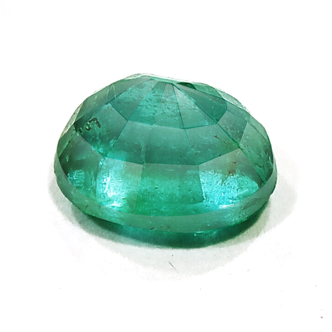"Close-up of a radiant Zambian Emerald showcasing its vibrant green color and faceted cut."