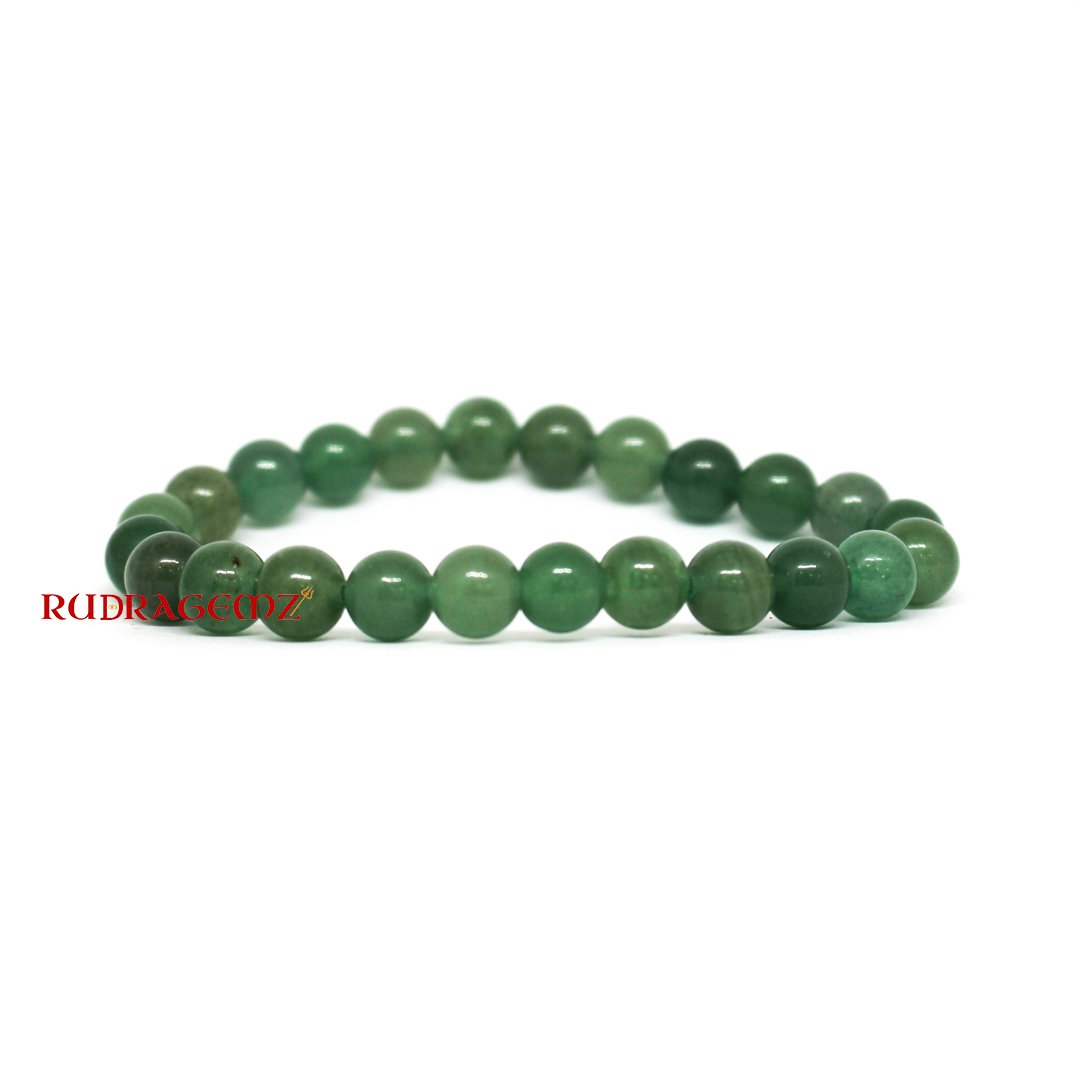 A close-up of a Green Aventurine Bracelet featuring smooth, polished gemstone beads with a soft green hue.