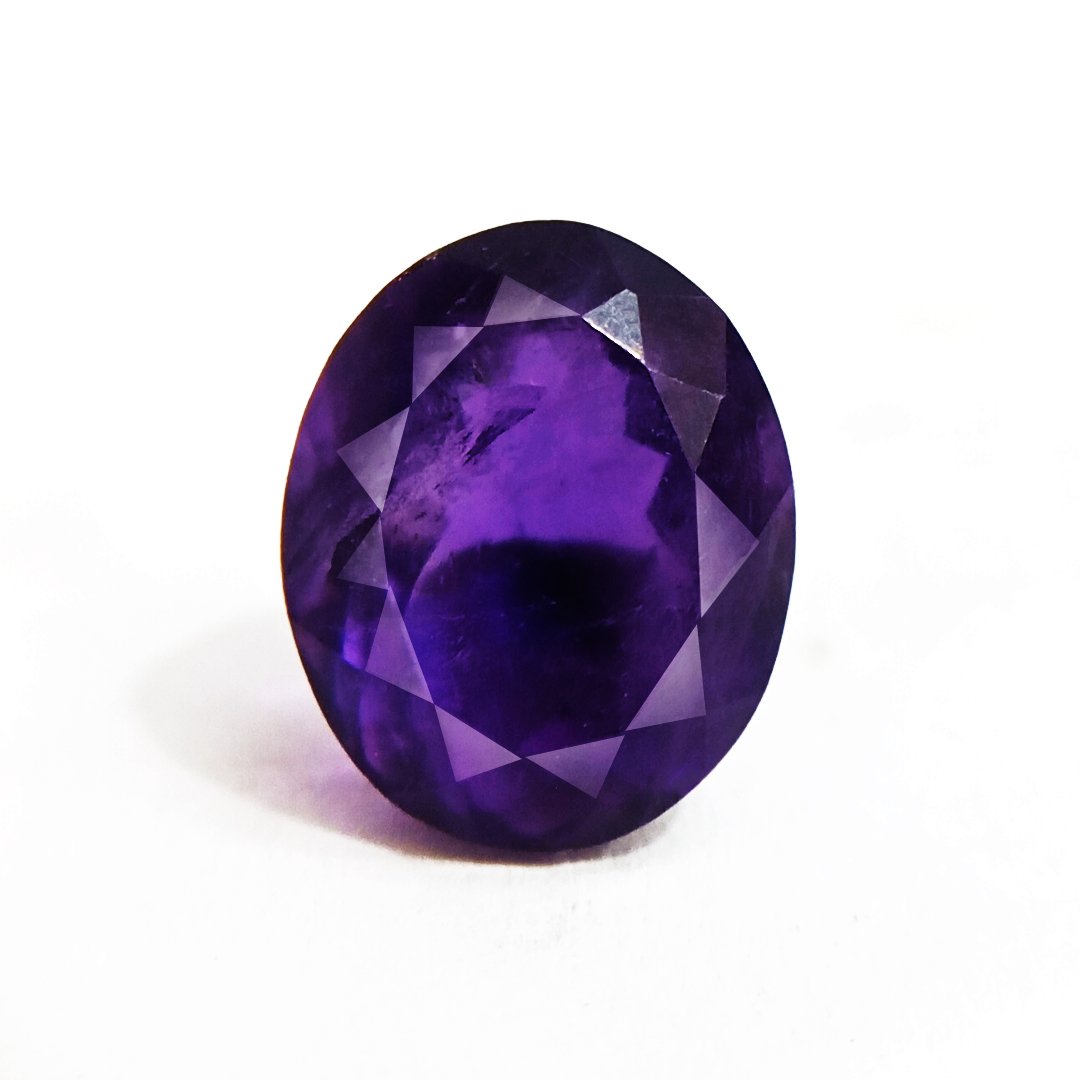 A beautiful Natural Amethyst gemstone with a deep purple hue, symbolizing peace, clarity, and spiritual growth.