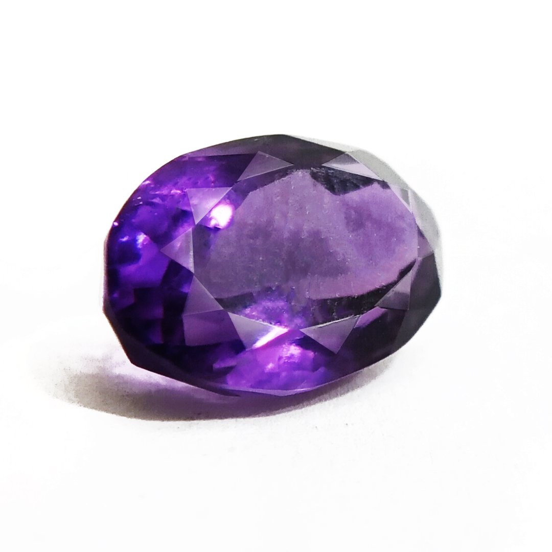 A beautiful Natural Amethyst gemstone with a deep purple hue, symbolizing peace, clarity, and spiritual growth.