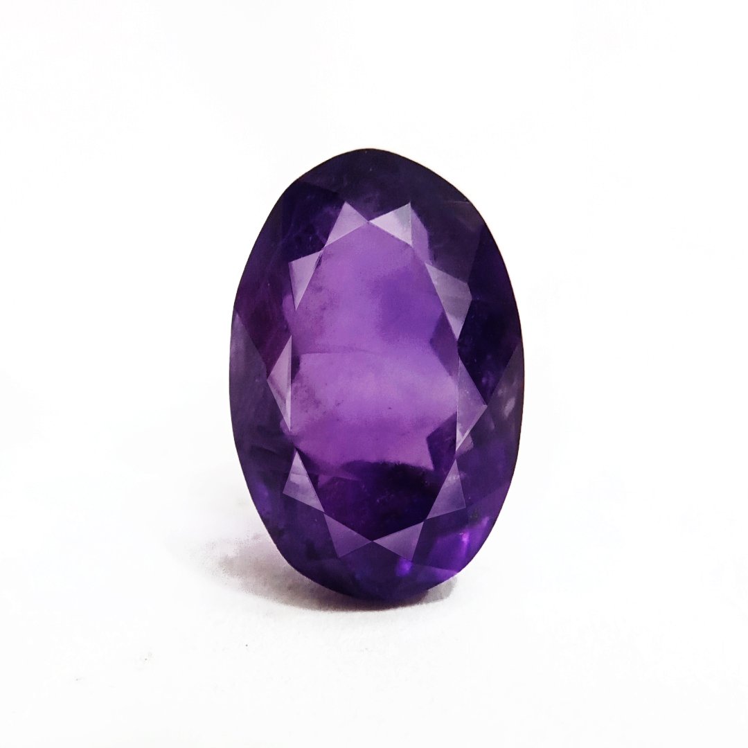 A beautiful Natural Amethyst gemstone with a deep purple hue, symbolizing peace, clarity, and spiritual growth.