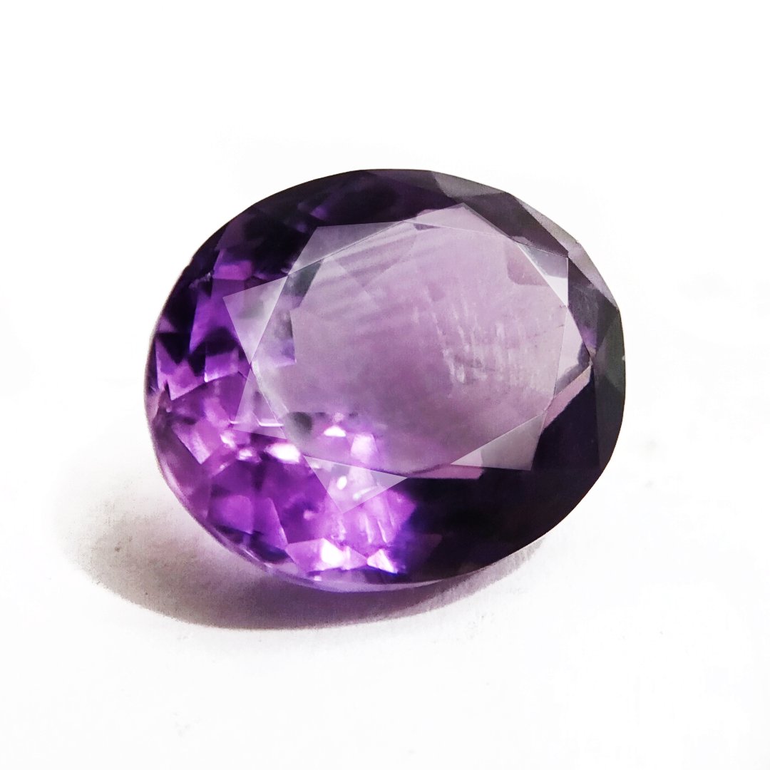 A beautiful Natural Amethyst gemstone with a deep purple hue, symbolizing peace, clarity, and spiritual growth.