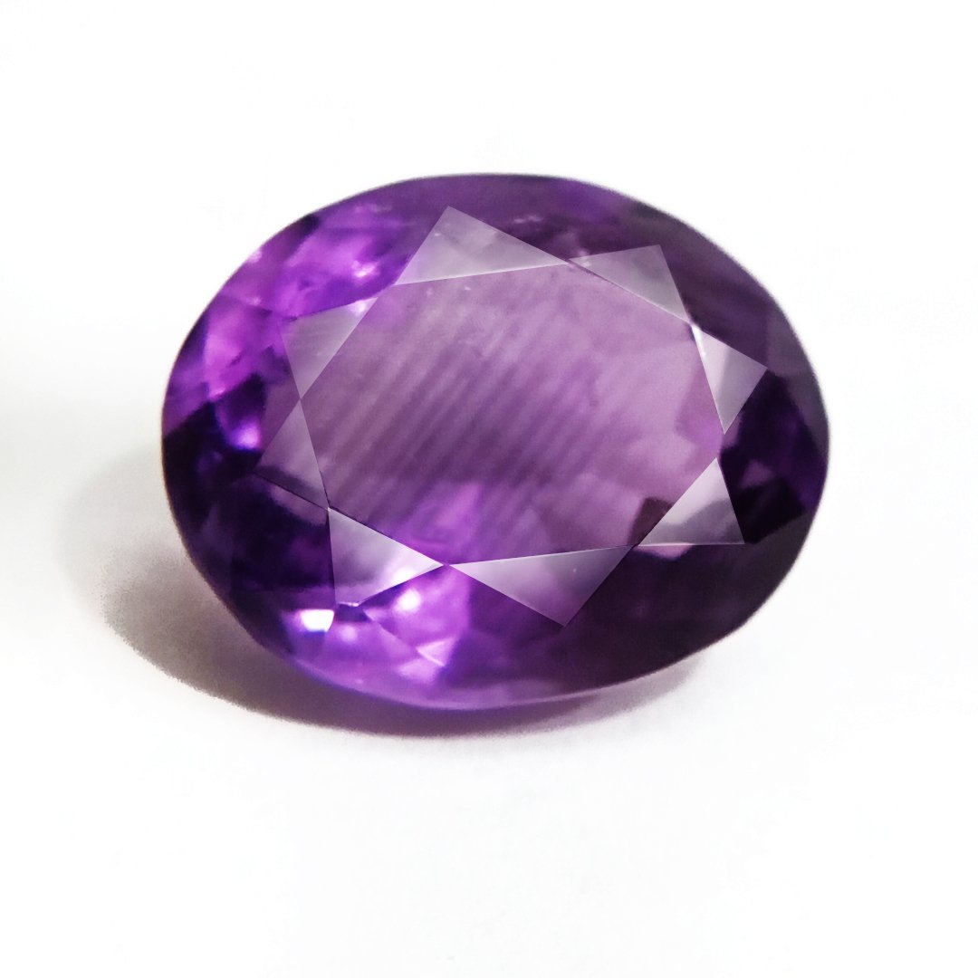 A beautiful Natural Amethyst gemstone with a deep purple hue, symbolizing peace, clarity, and spiritual growth.