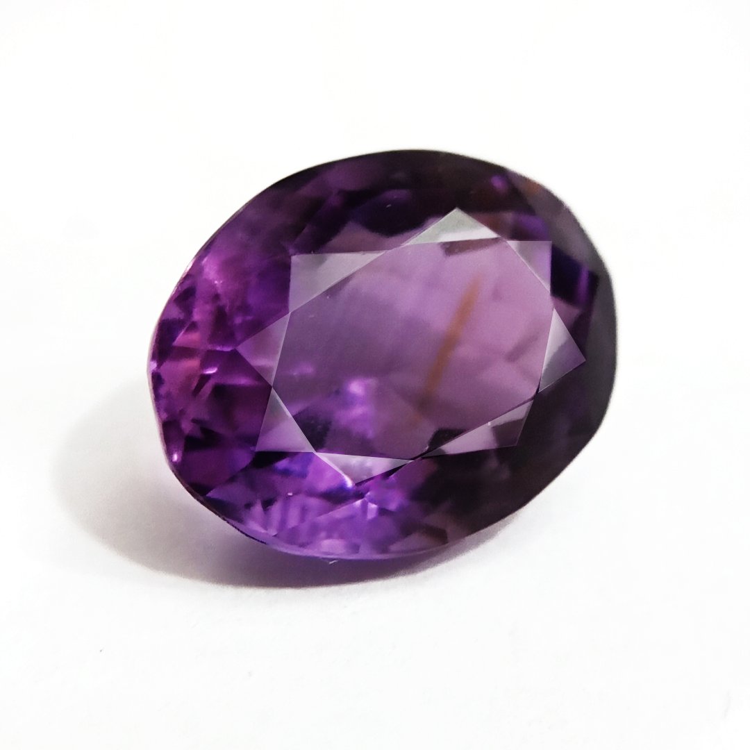 A beautiful Natural Amethyst gemstone with a deep purple hue, symbolizing peace, clarity, and spiritual growth.