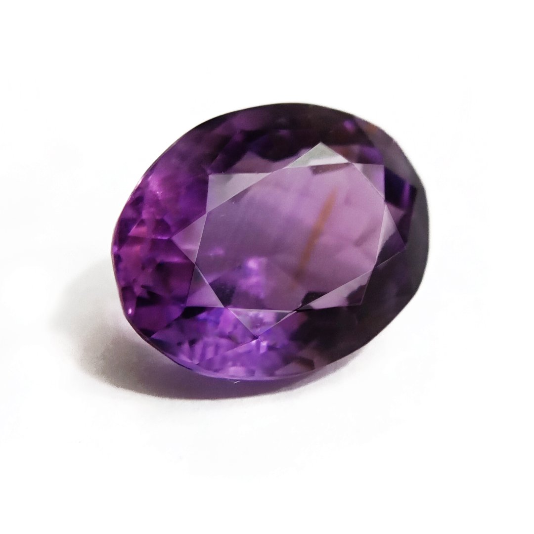 A beautiful Natural Amethyst gemstone with a deep purple hue, symbolizing peace, clarity, and spiritual growth.
