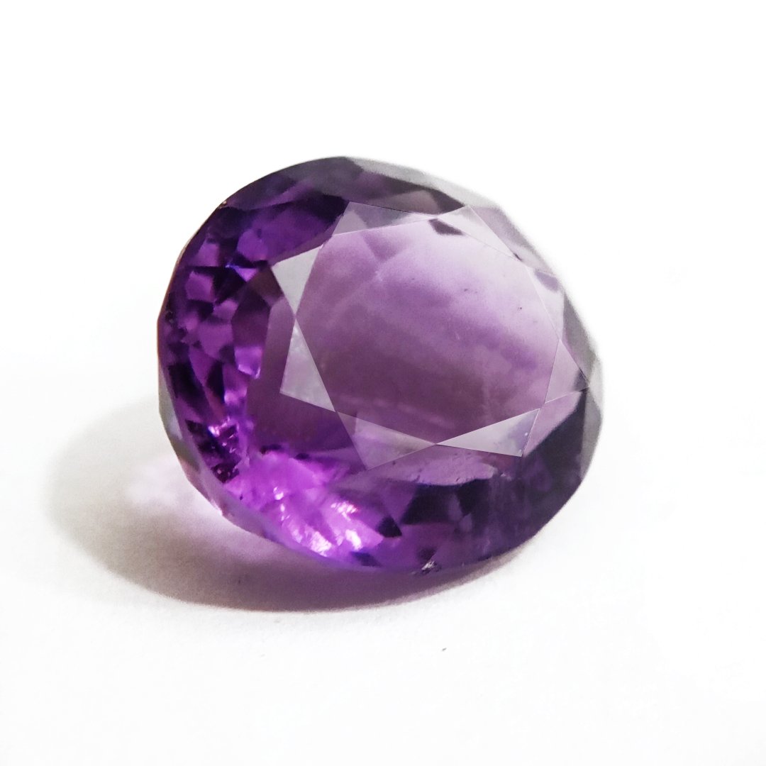 A beautiful Natural Amethyst gemstone with a deep purple hue, symbolizing peace, clarity, and spiritual growth.