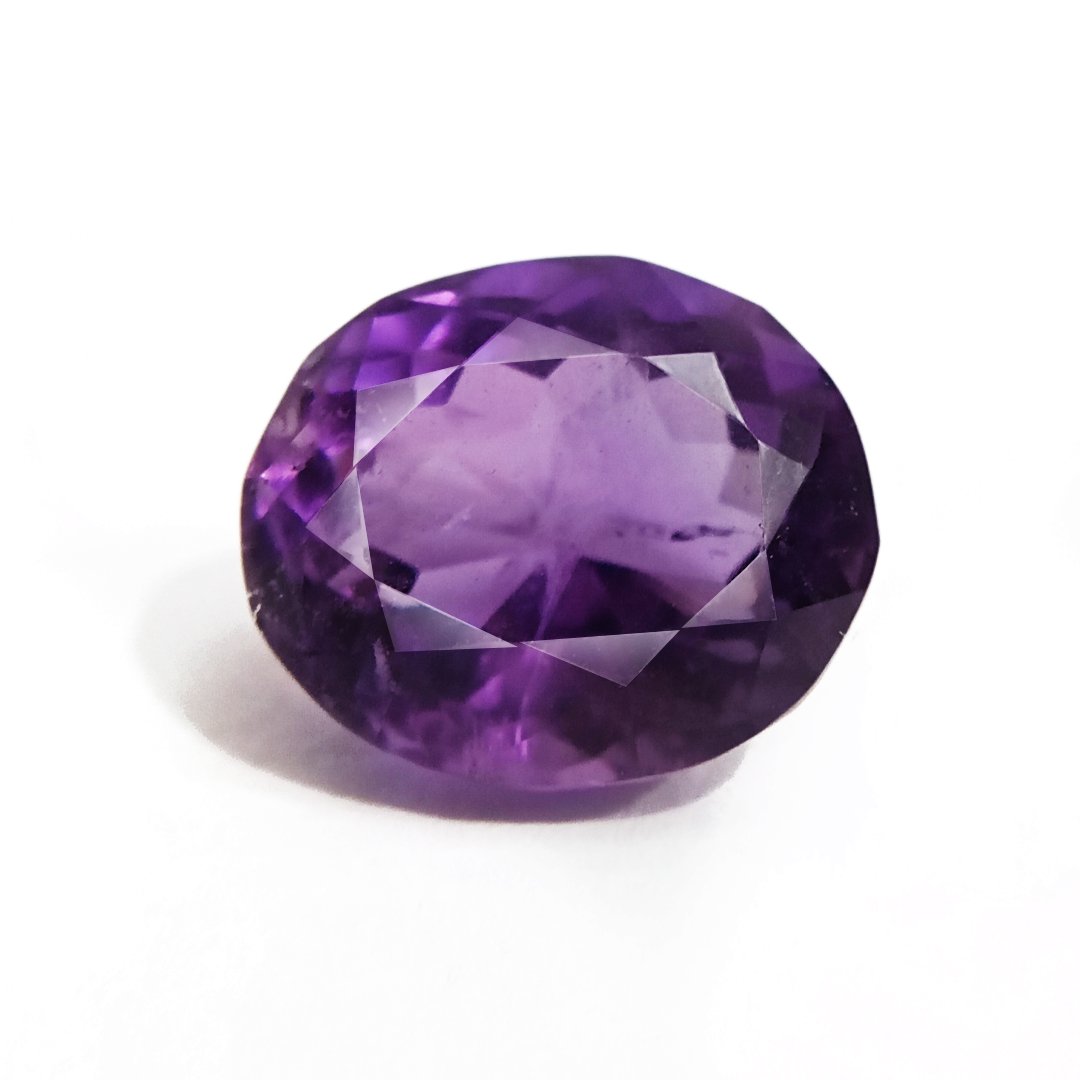 A beautiful Natural Amethyst gemstone with a deep purple hue, symbolizing peace, clarity, and spiritual growth.