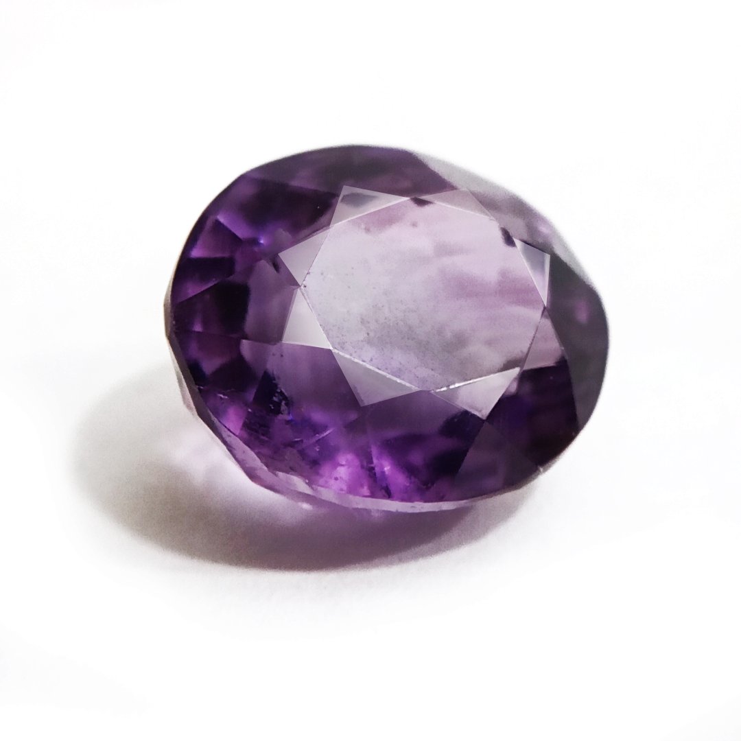 A beautiful Natural Amethyst gemstone with a deep purple hue, symbolizing peace, clarity, and spiritual growth.