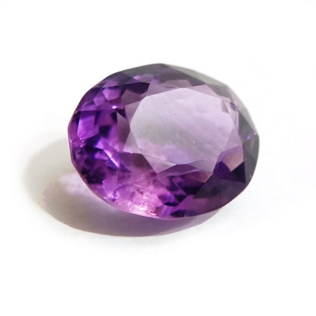 A beautiful Natural Amethyst gemstone with a deep purple hue, symbolizing peace, clarity, and spiritual growth.