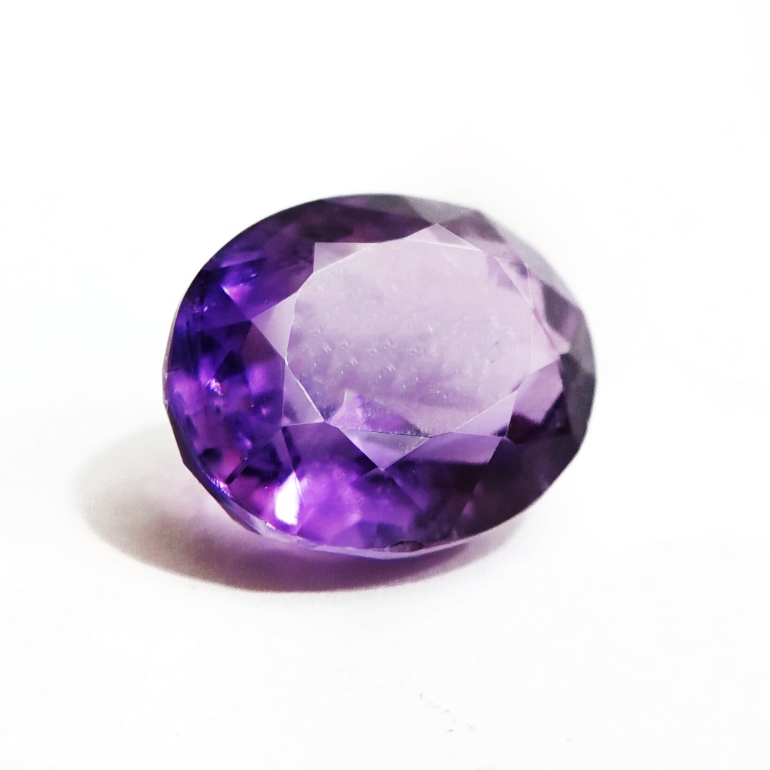 A beautiful Natural Amethyst gemstone with a deep purple hue, symbolizing peace, clarity, and spiritual growth.