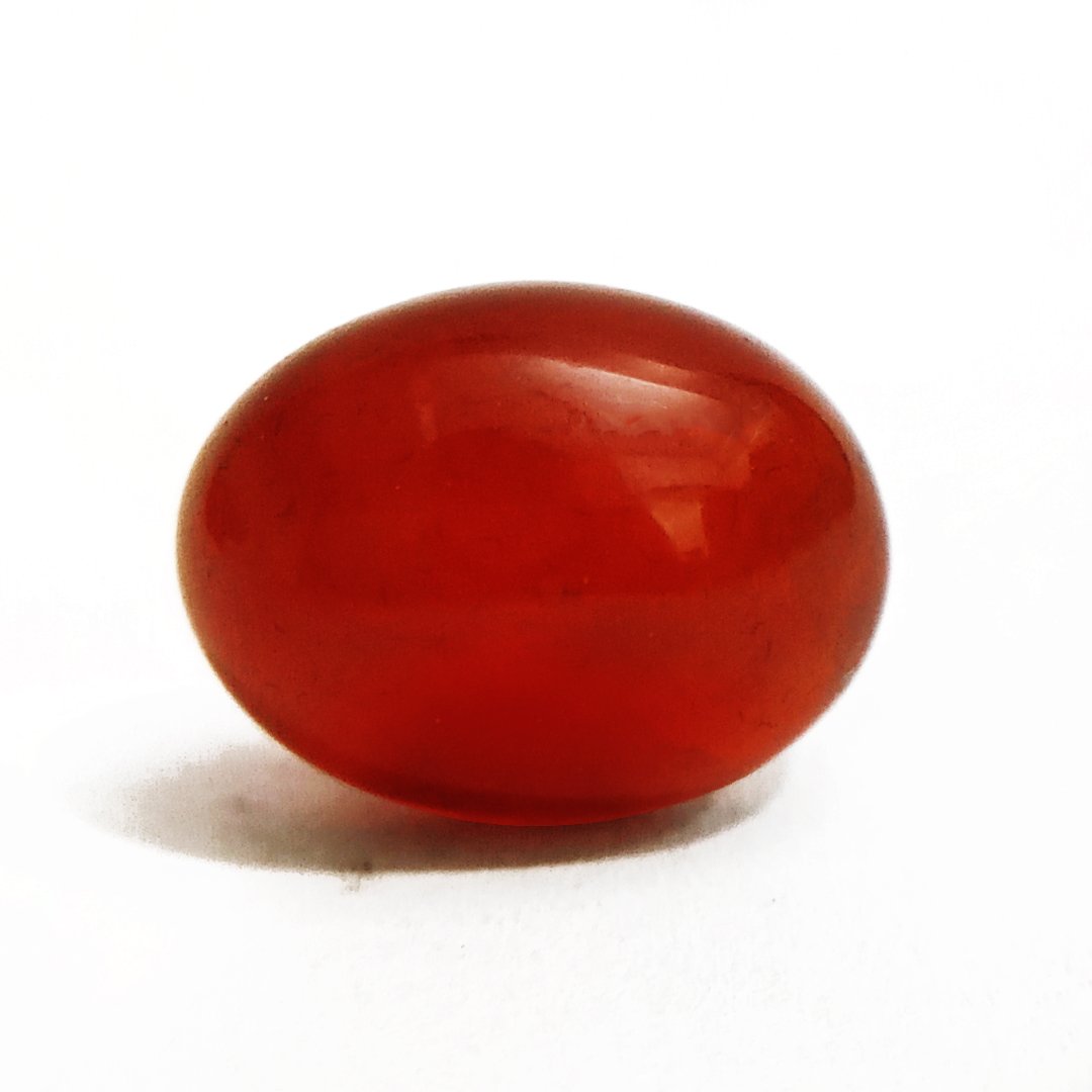 Vibrant Natural Carnelian gemstone with warm orange-red hues, symbolizing motivation, courage, and creativity.