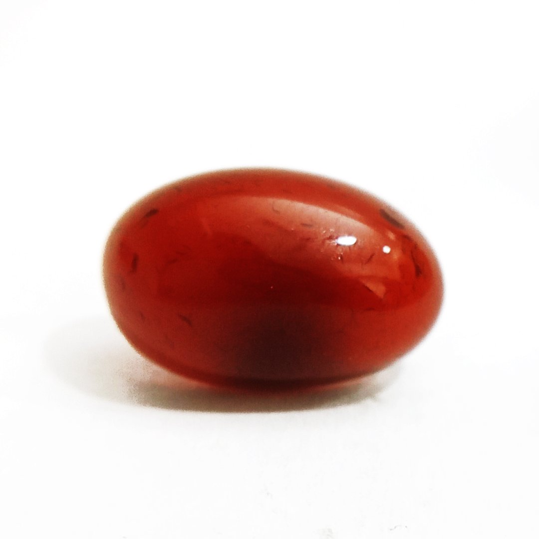 Vibrant Natural Carnelian gemstone with warm orange-red hues, symbolizing motivation, courage, and creativity.