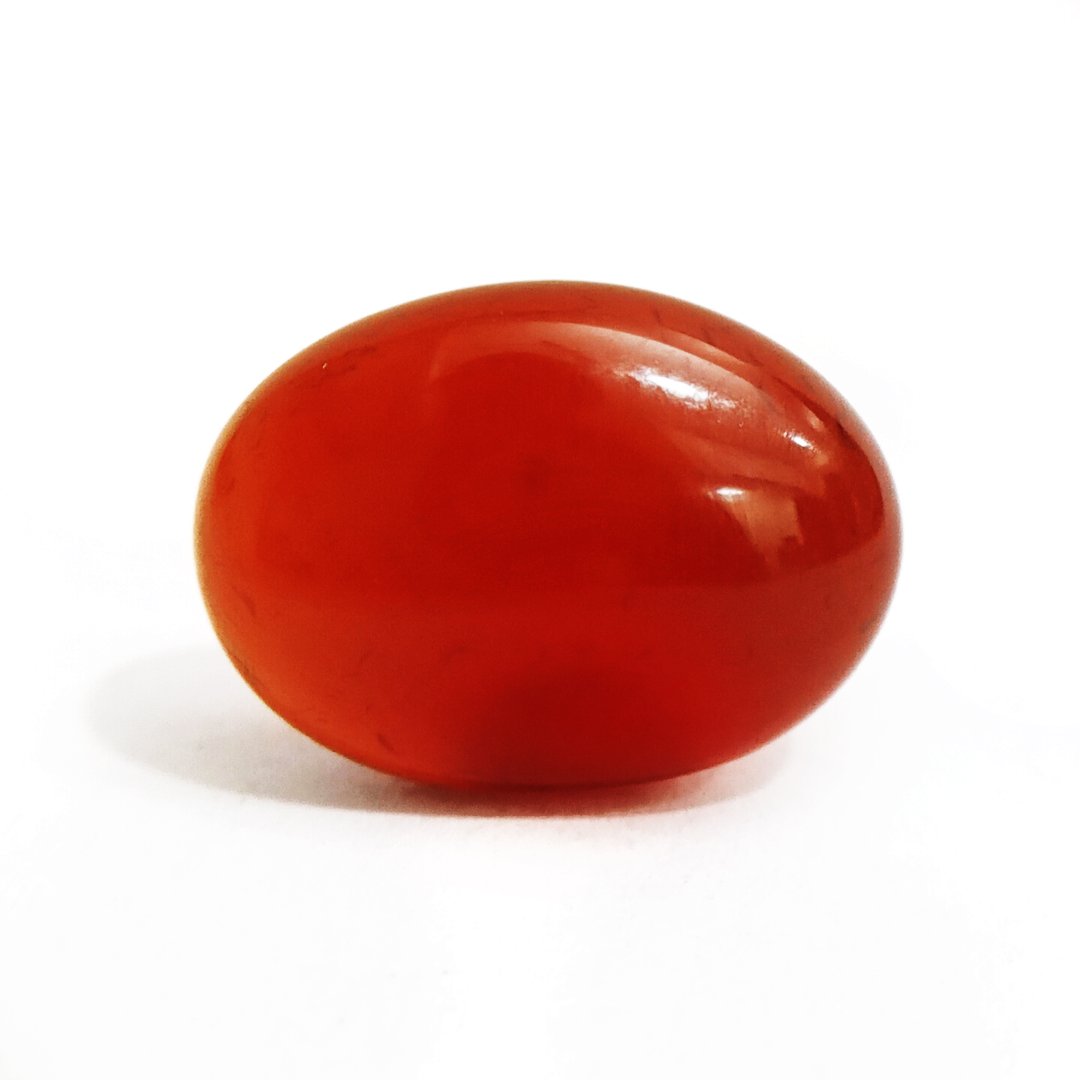 Vibrant Natural Carnelian gemstone with warm orange-red hues, symbolizing motivation, courage, and creativity.