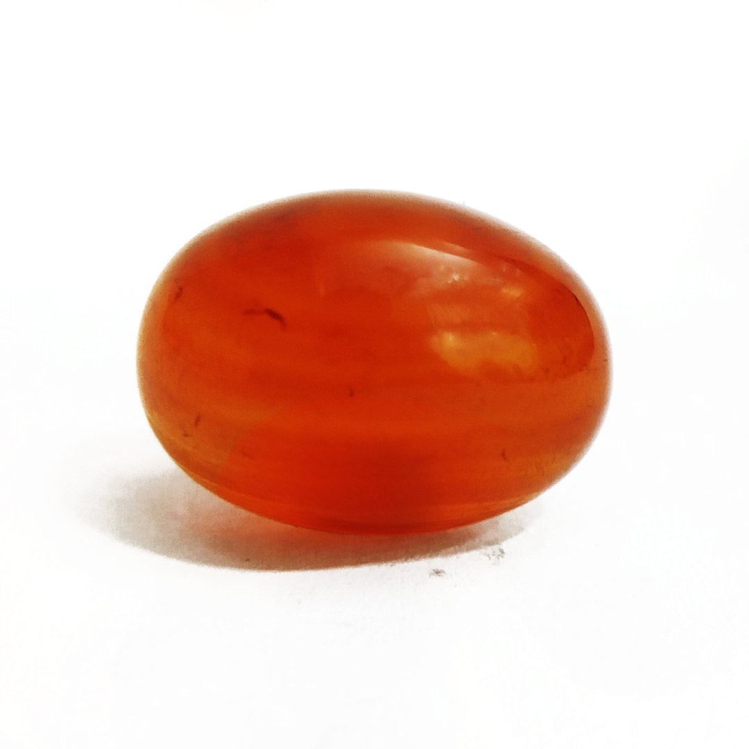 Vibrant Natural Carnelian gemstone with warm orange-red hues, symbolizing motivation, courage, and creativity.