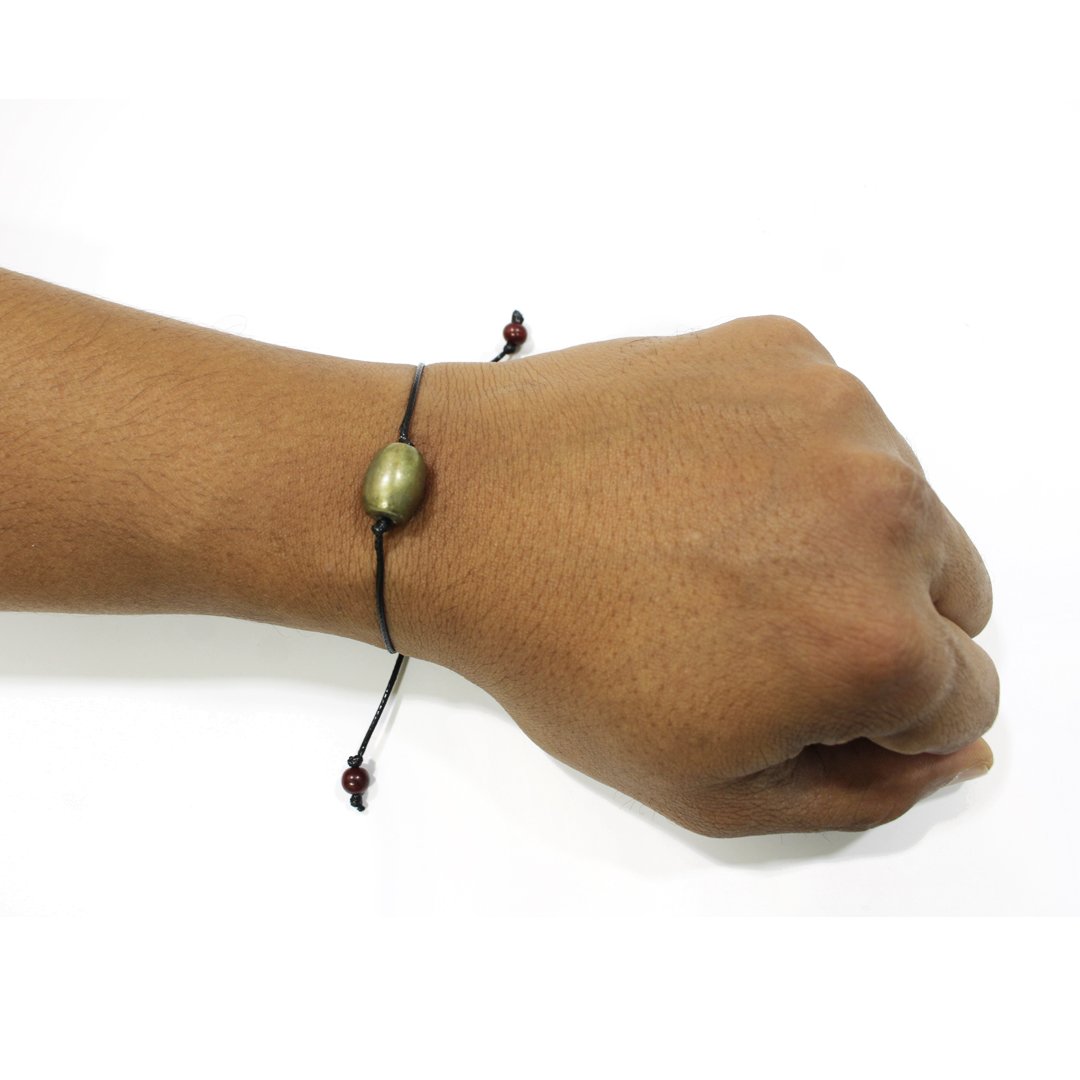 A Parad Bracelet – Drum Shape, showcasing its smooth metallic beads and spiritual significance.