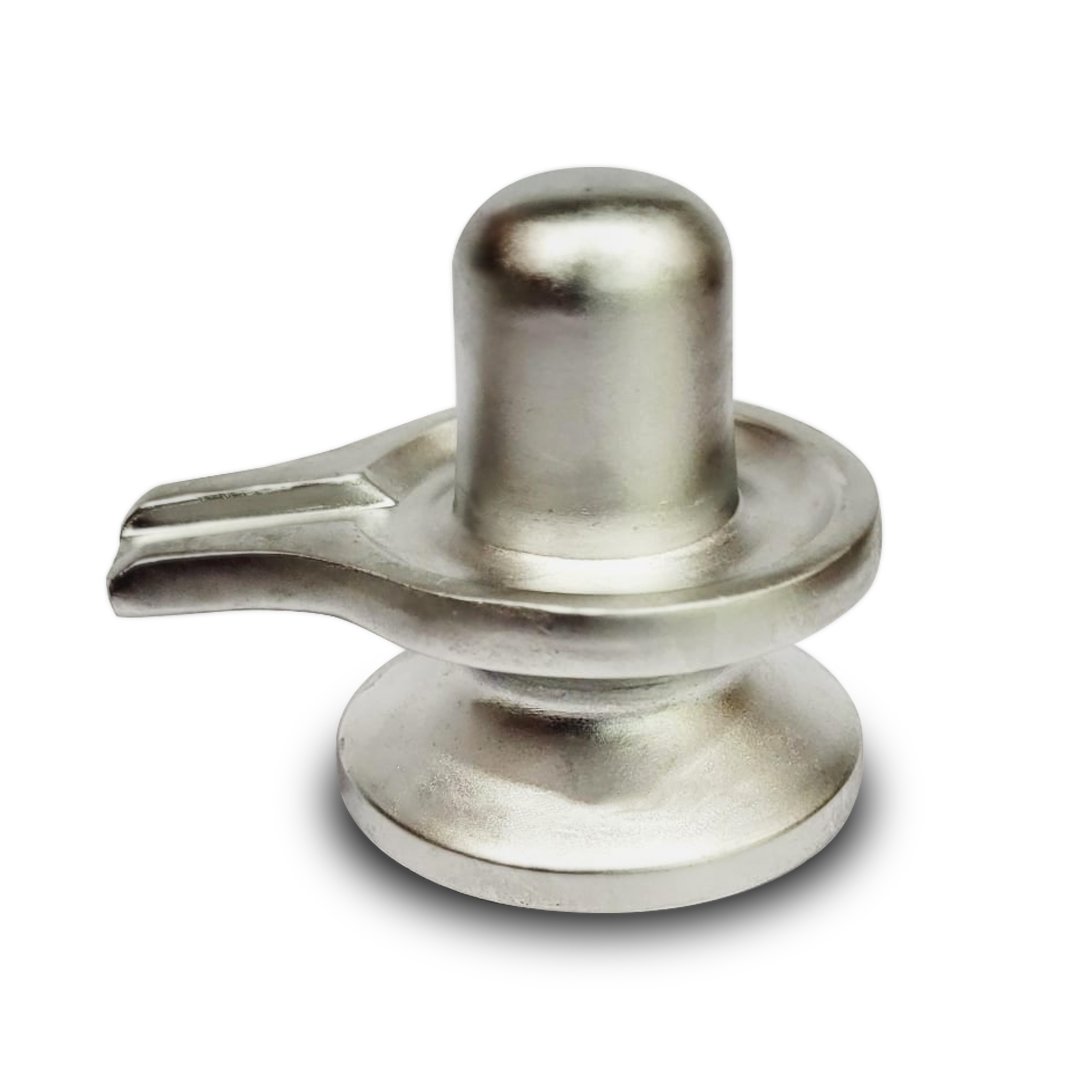 A close-up of a Natural Parad Shivlingam, showcasing its smooth, metallic finish and divine energy.