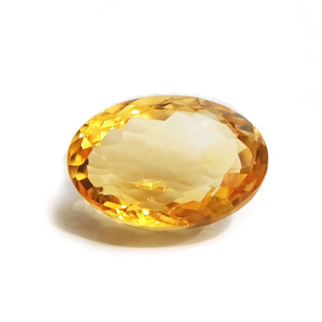 A close-up of a Natural Yellow Citrine gemstone with vibrant golden-yellow hues and sparkling clarity.