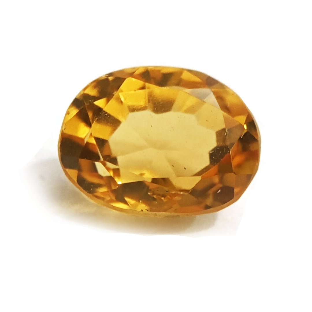 A close-up of a Natural Yellow Citrine gemstone with vibrant golden-yellow hues and sparkling clarity.