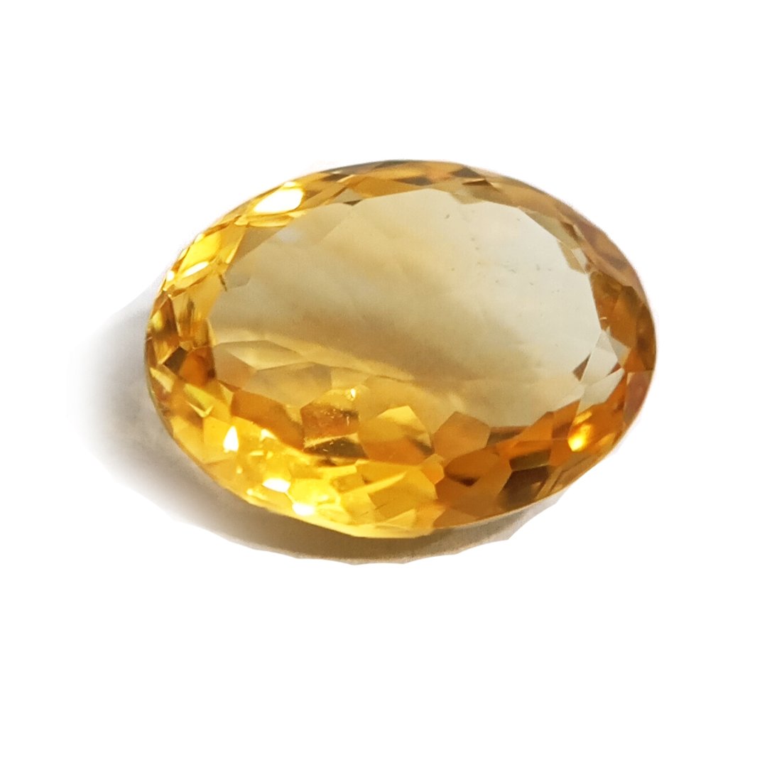 A close-up of a Natural Yellow Citrine gemstone with vibrant golden-yellow hues and sparkling clarity.